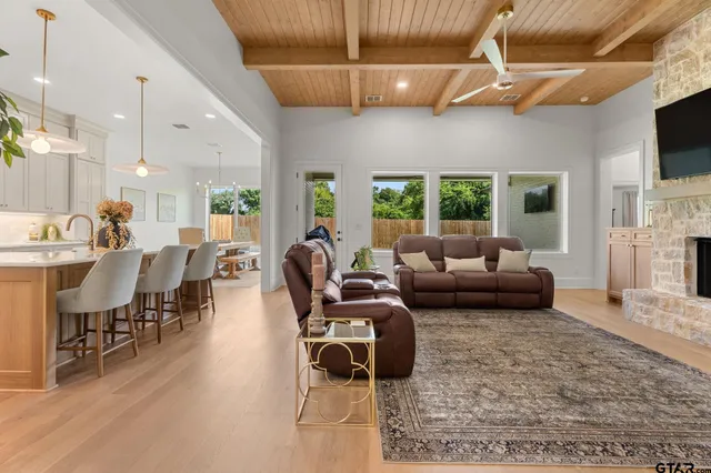 a bathroom with a granite countertop sink