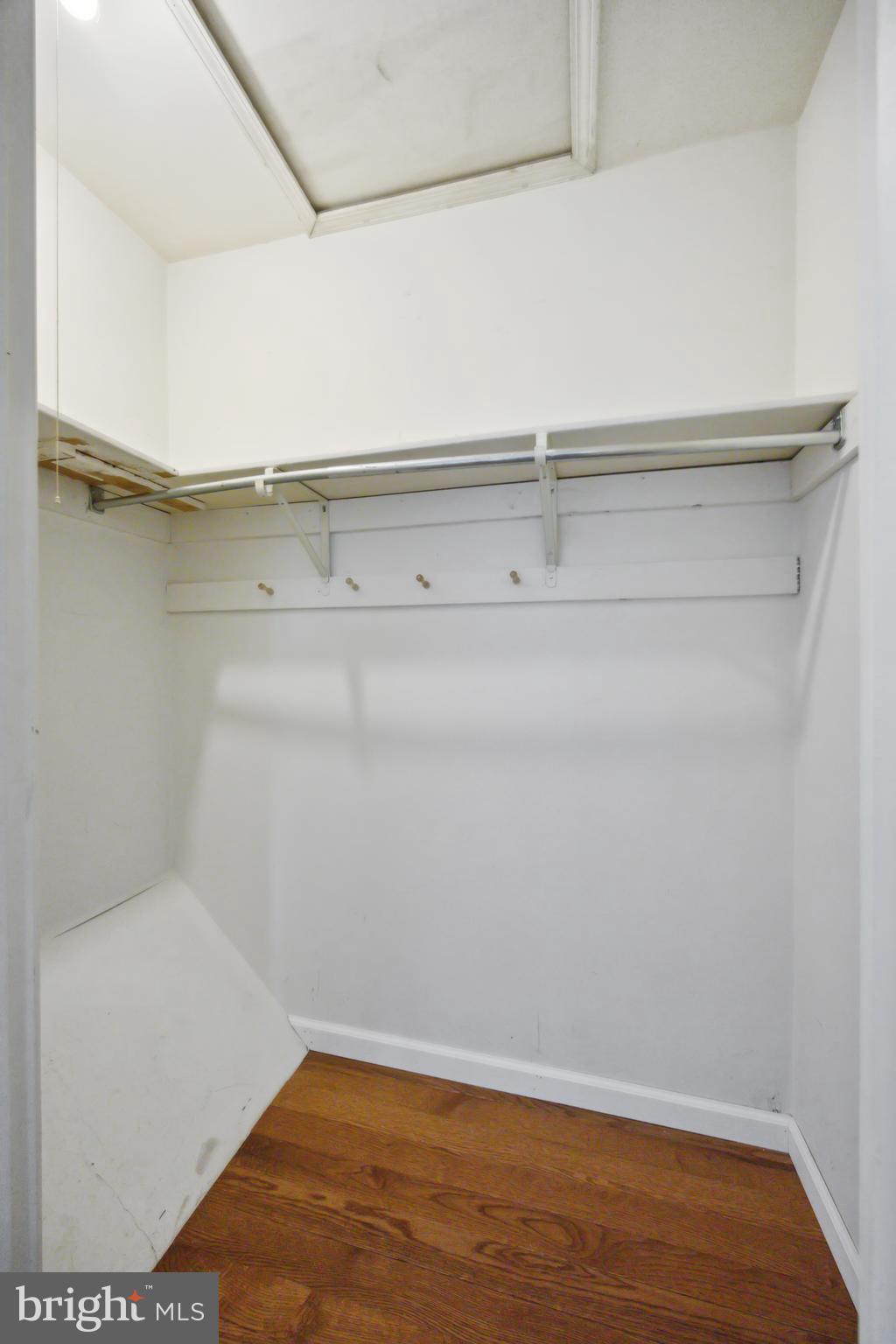 411 Conestoga Road, Unit 27 Devon, PA 19333 - Photo 15 of 15 a view of storage and utility room with wooden floor