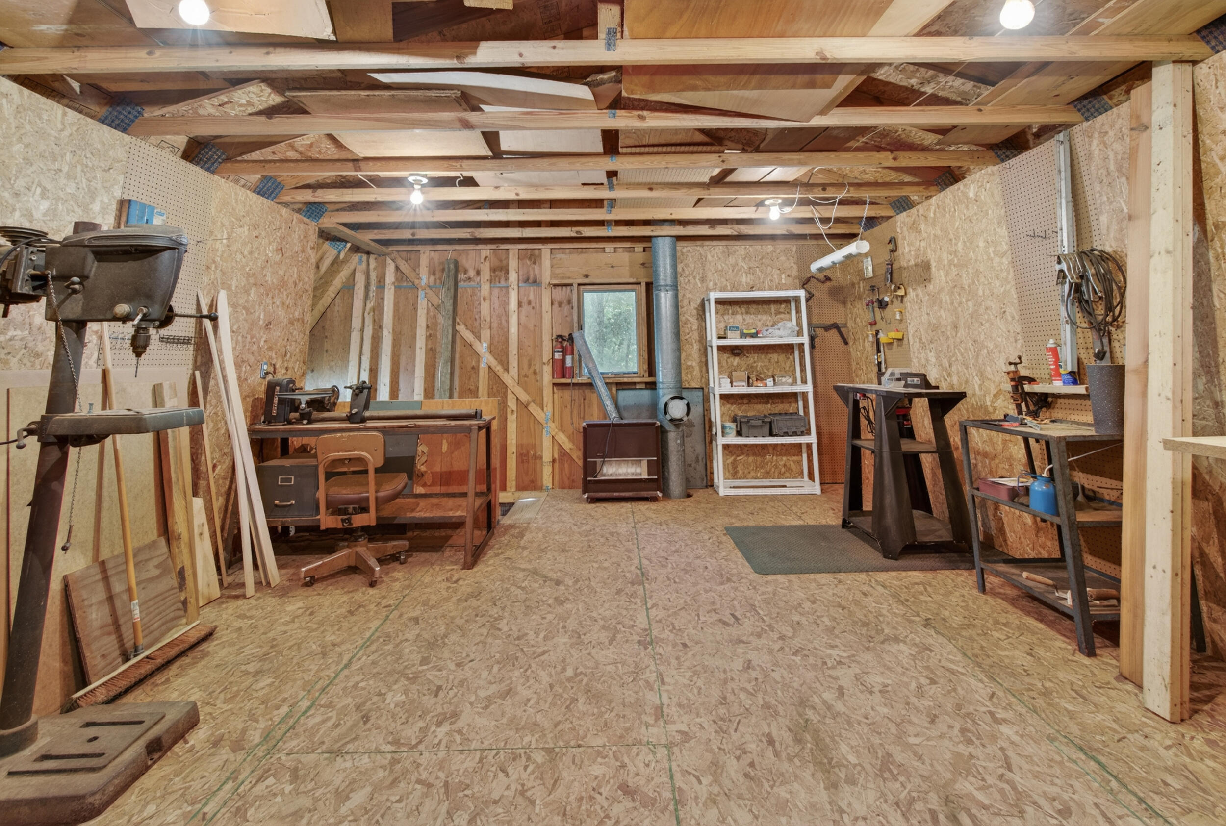 7789 Thorne Road Horton, MI 49246 - Photo 57 of 65 Second Story Woodshop / Work Area
