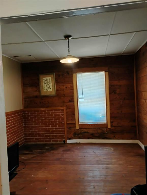 763 Frontier Street Bowie, TX 76230 - Photo 12 of 28 a view of wooden door