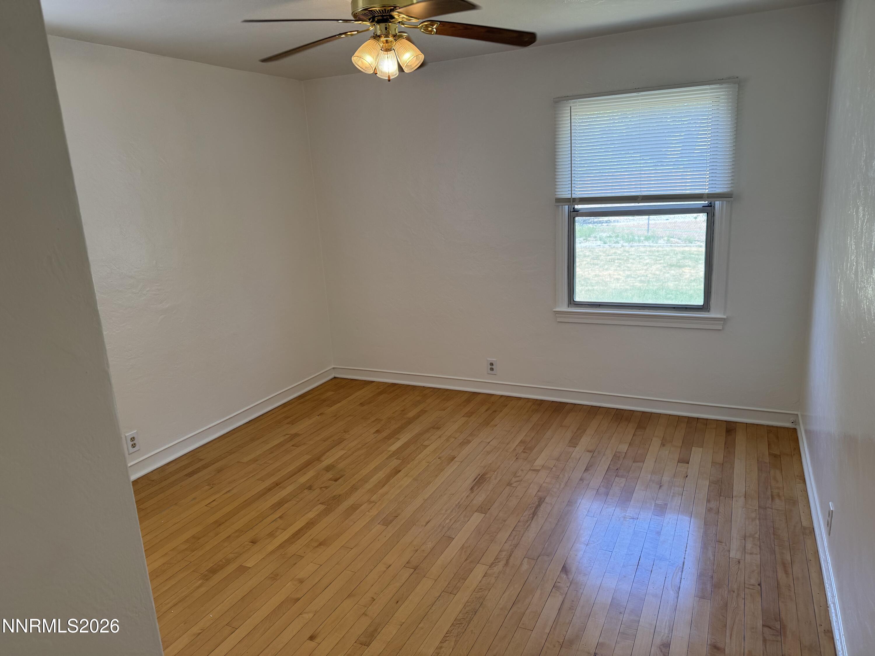 70 Arden Circle Reno, NV 89503 - Photo 9 of 15 a view of empty room with wooden floor