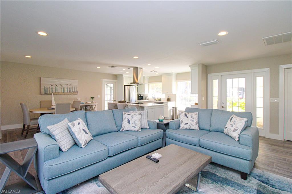 1353 Pelican Avenue Naples, FL 34102 - Photo 15 of 41 a living room with furniture and a large window