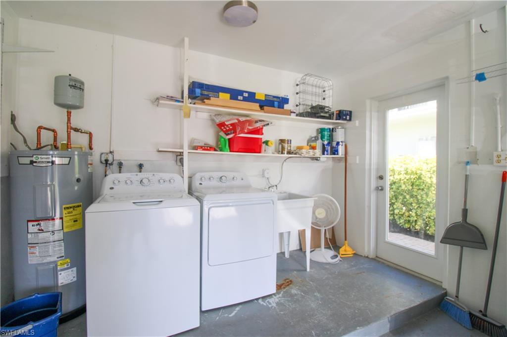 1353 Pelican Avenue Naples, FL 34102 - Photo 41 of 41 a utility room with dryer and washer