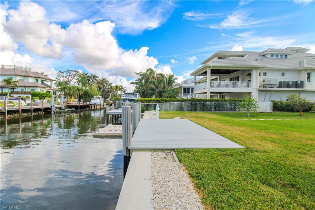 1353 Pelican Avenue Naples, FL 34102 - Photo 6 of 41 a view of a house with a yard