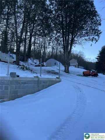 a view of yard with tree s