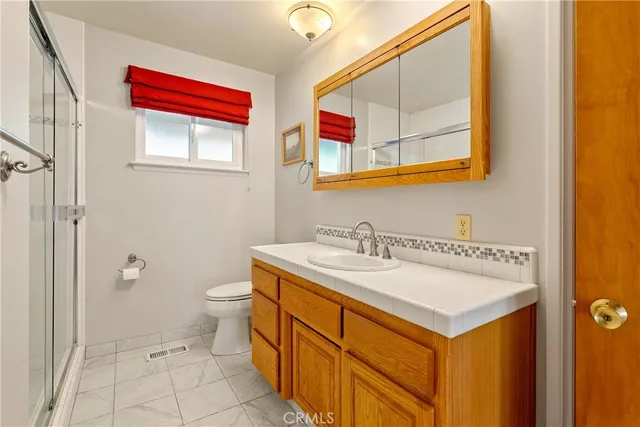 a view of deck with chairs and wooden floor