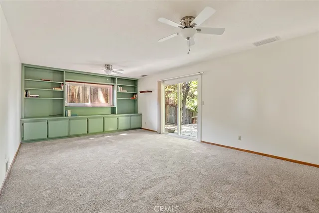 a view of a house with a street