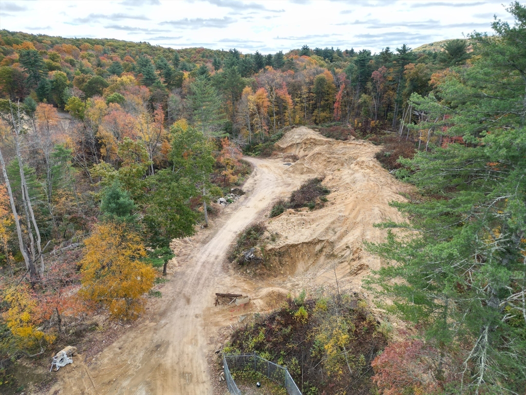 727 Brimfield Road Warren, MA 01585 - Photo 8 of 12 a view of a yard with a mountain