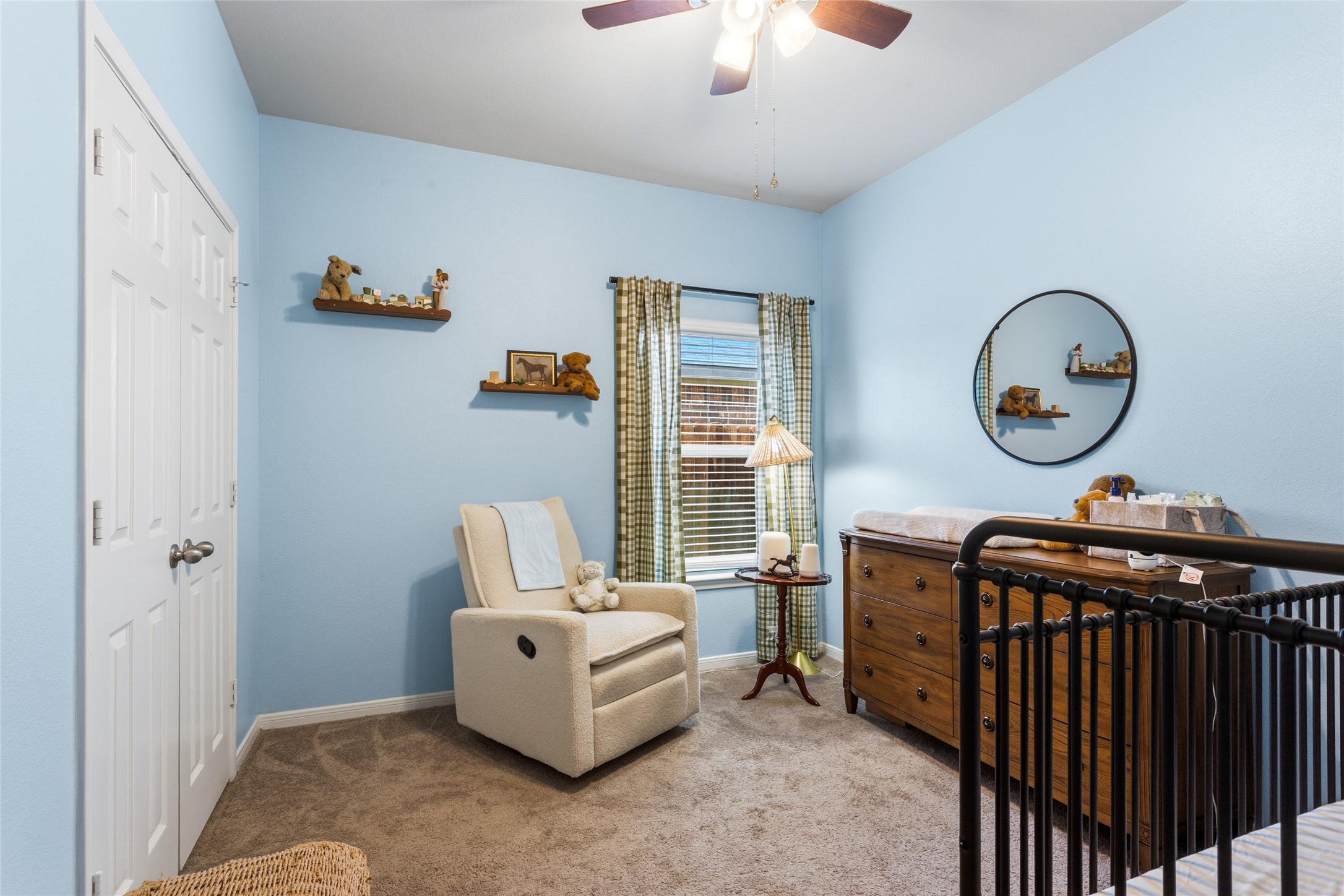 7254 Victorville Drive Rosharon, TX 77583 - Photo 14 of 27 a living room with furniture a rug and a window