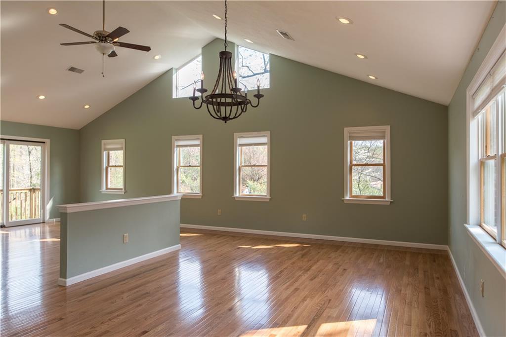 4041 Dickey Road Gibsonia, PA 15044 - Photo 2 of 23 Light pours through multiple windows onto the gleaming hardwood floors in the massive great room.