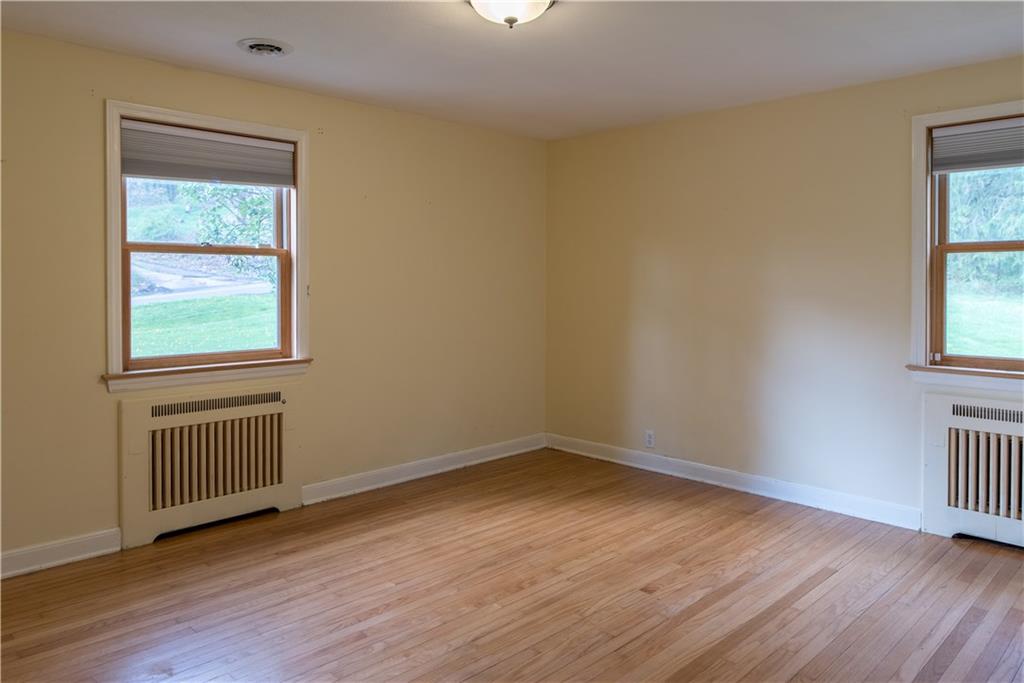 4041 Dickey Road Gibsonia, PA 15044 - Photo 14 of 23 The second bedroom on the main floor is also large and bright.