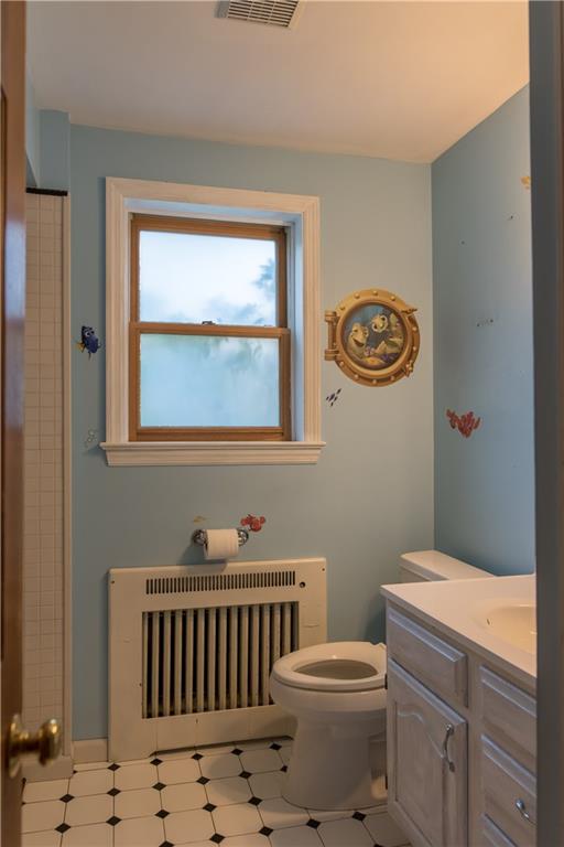 4041 Dickey Road Gibsonia, PA 15044 - Photo 15 of 23 The main bath on the first floor is classic black and white tile with a neutral gray tub. The current owners turned it into an underwater oasis for their children. Don't love Nemo? No worries ... the decals easily peel off without damaging the walls or paint.