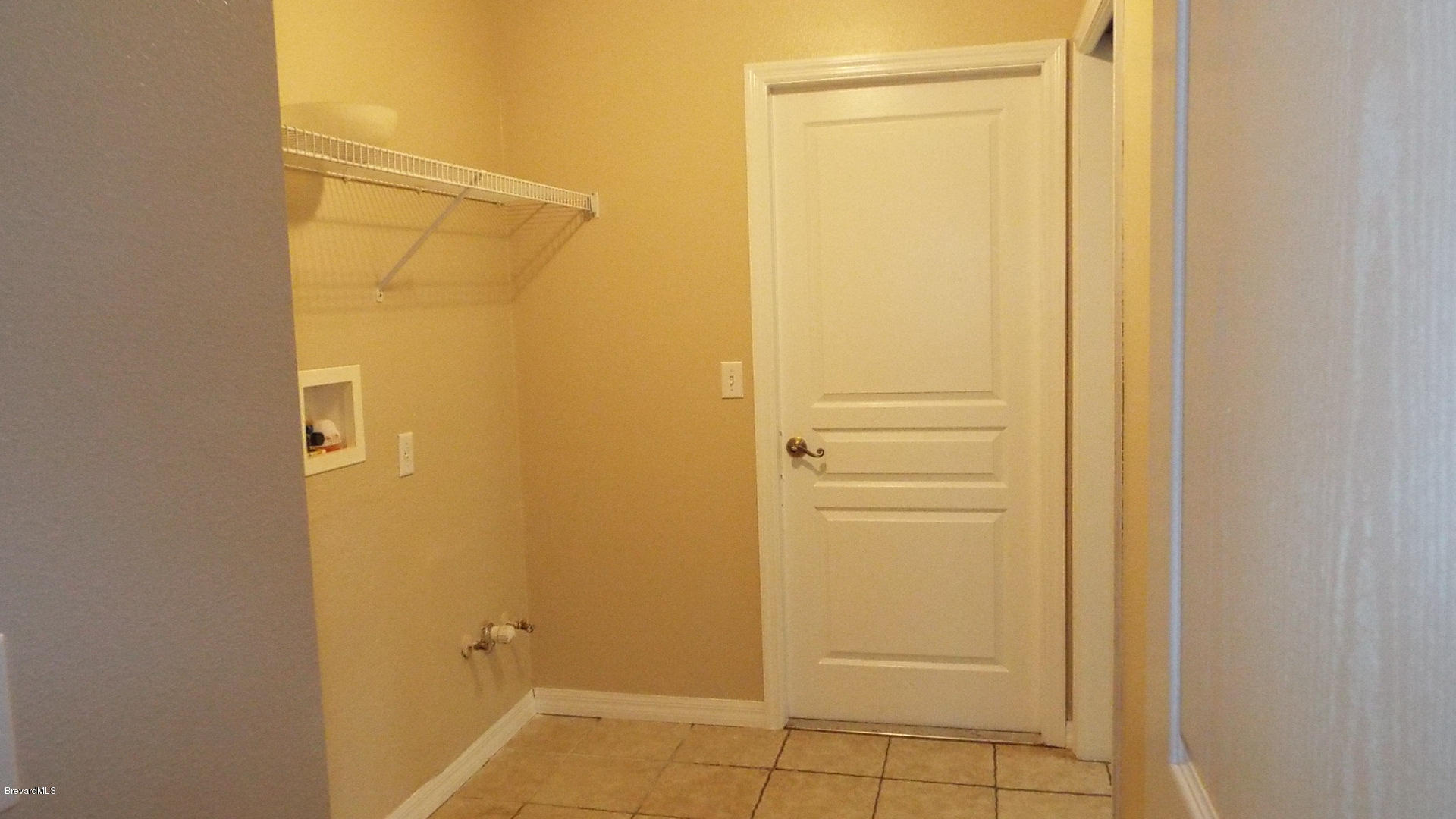 3660 Grant Line Road Mims, FL 32754 - Photo 8 of 28 laundry area