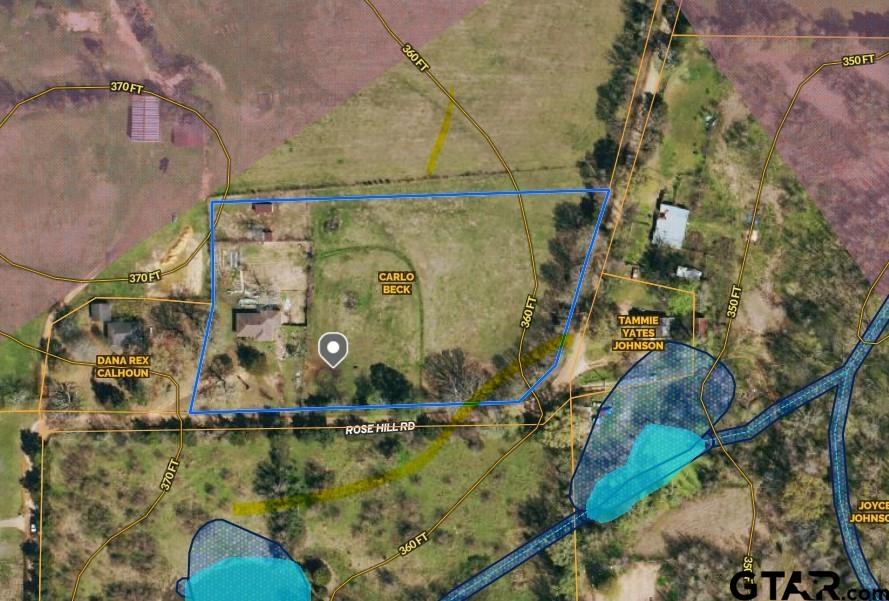 729 Rose Hill Road Timpson, TX 75975 - Photo 14 of 14 an aerial view of a house with a yard