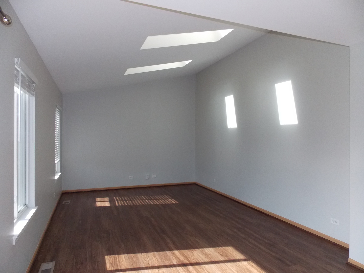 3312 Allen Street Plano, IL 60545 - Photo 11 of 21 a view of empty room with wooden floor and windows