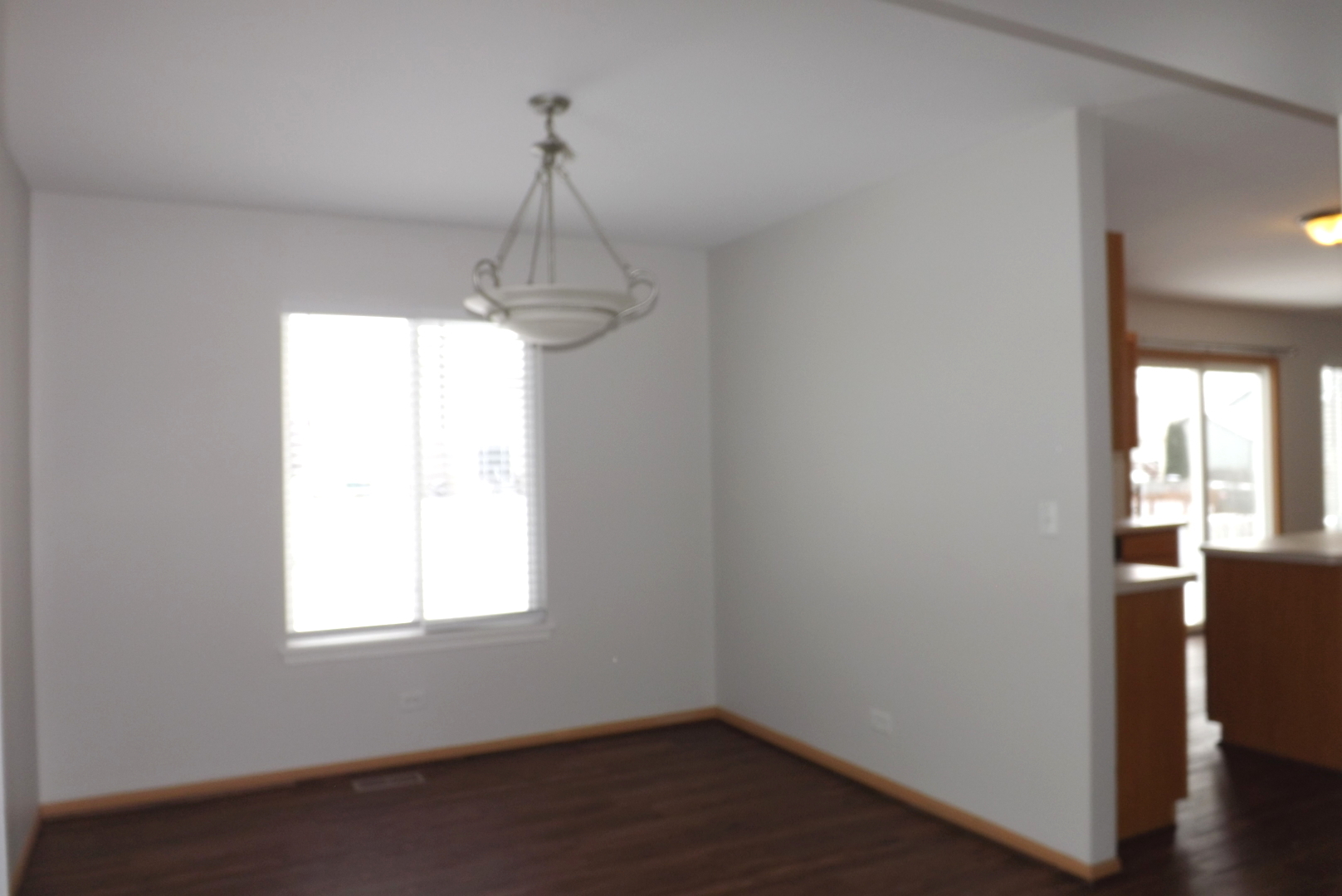 3312 Allen Street Plano, IL 60545 - Photo 5 of 21 a decorative lighting & window in a room