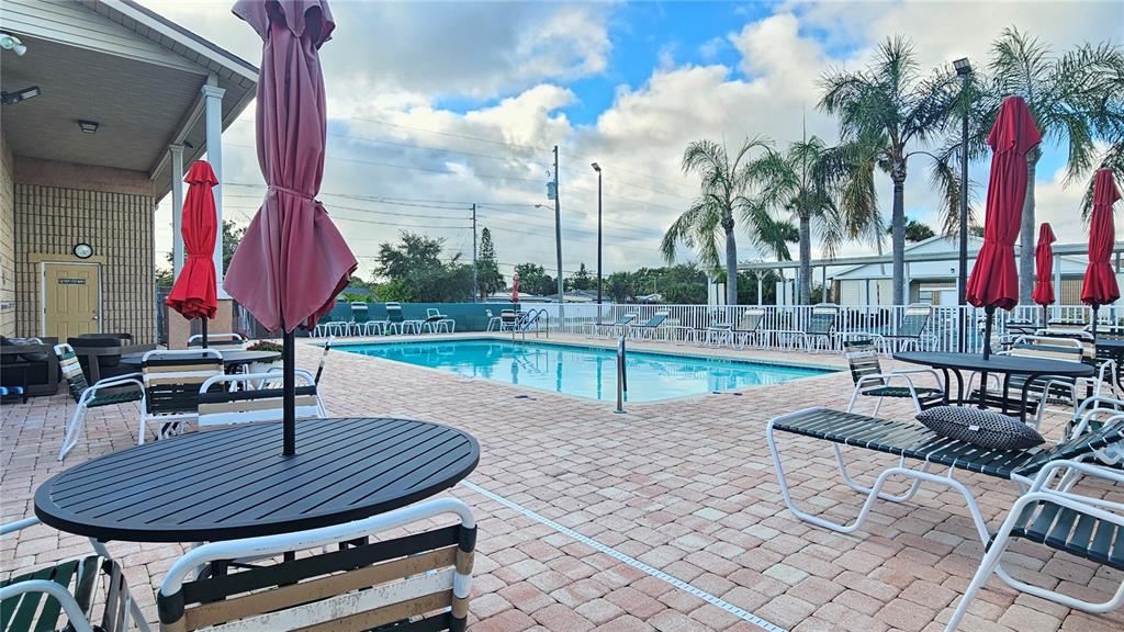 8210 Bull Run Drive New Port Richey, FL 34653 - Photo 24 of 30 a view of a backyard with swimming pool