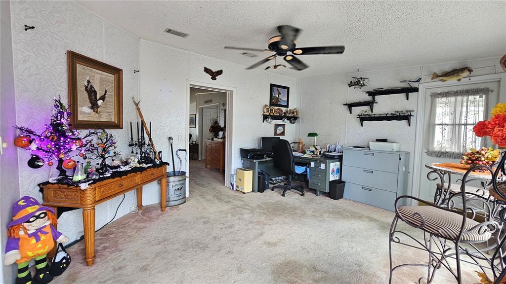 8210 Bull Run Drive New Port Richey, FL 34653 - Photo 5 of 30 a garage room with furniture and air hockey table