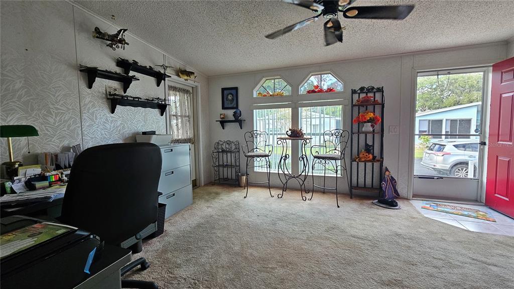 8210 Bull Run Drive New Port Richey, FL 34653 - Photo 6 of 30 a view of a livingroom with furniture and a window