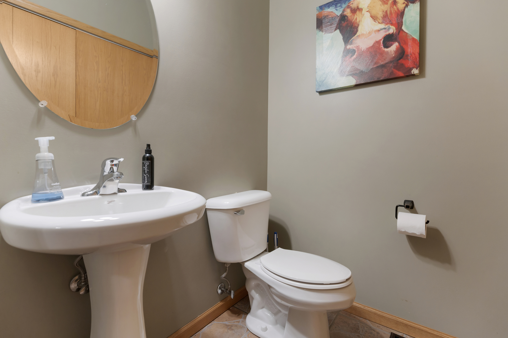 516 Clayton Circle, Unit 516 Sycamore, IL 60178 - Photo 12 of 26 a bathroom with a sink toilet and a mirror