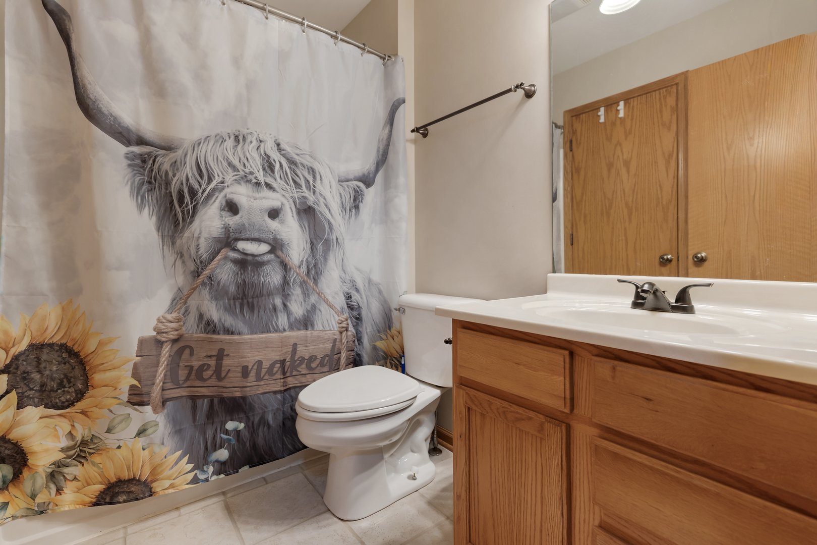 516 Clayton Circle, Unit 516 Sycamore, IL 60178 - Photo 17 of 26 a bathroom with a toilet sink and shower