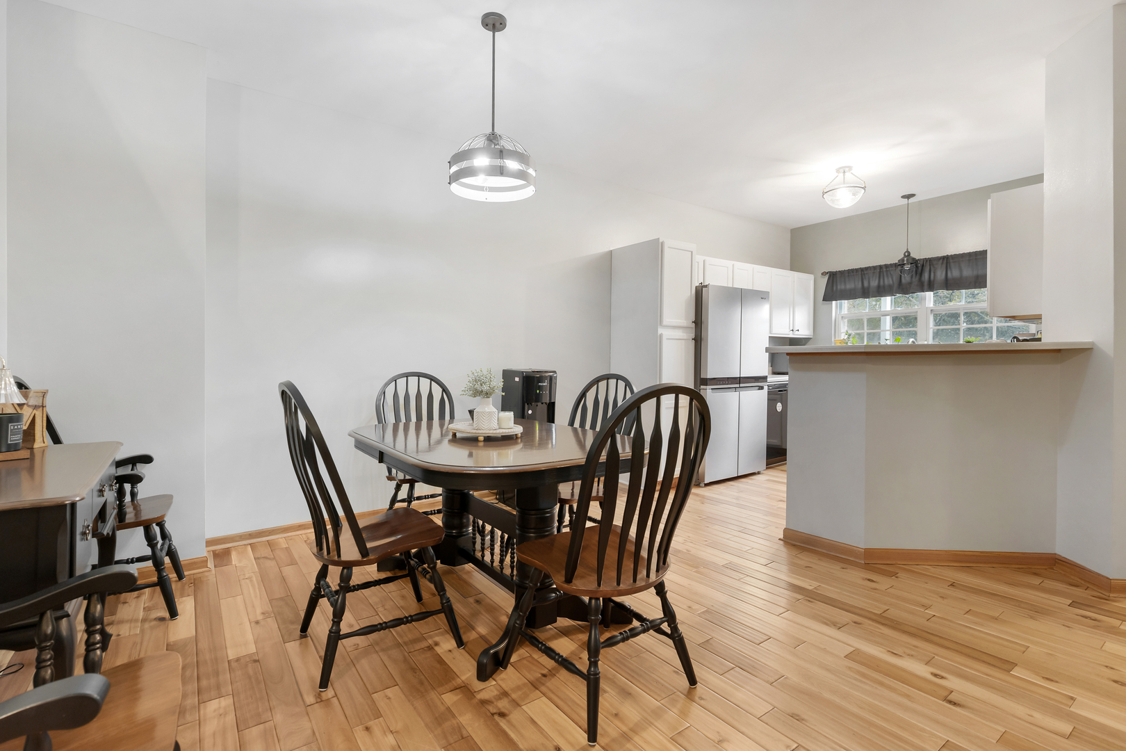 516 Clayton Circle, Unit 516 Sycamore, IL 60178 - Photo 8 of 26 a view of a dining room with furniture