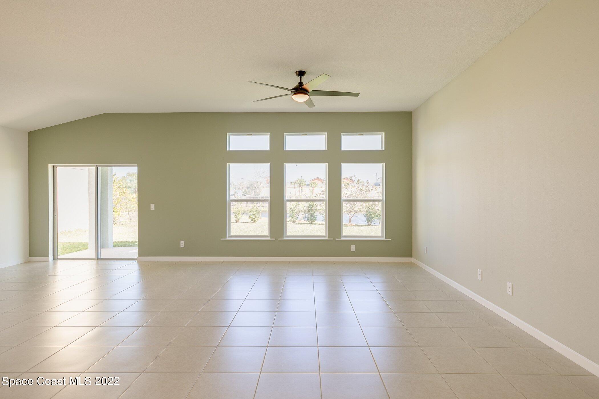 3555 Tabitha Court Melbourne, FL 32934 - Photo 13 of 30 a view of an empty room with a window