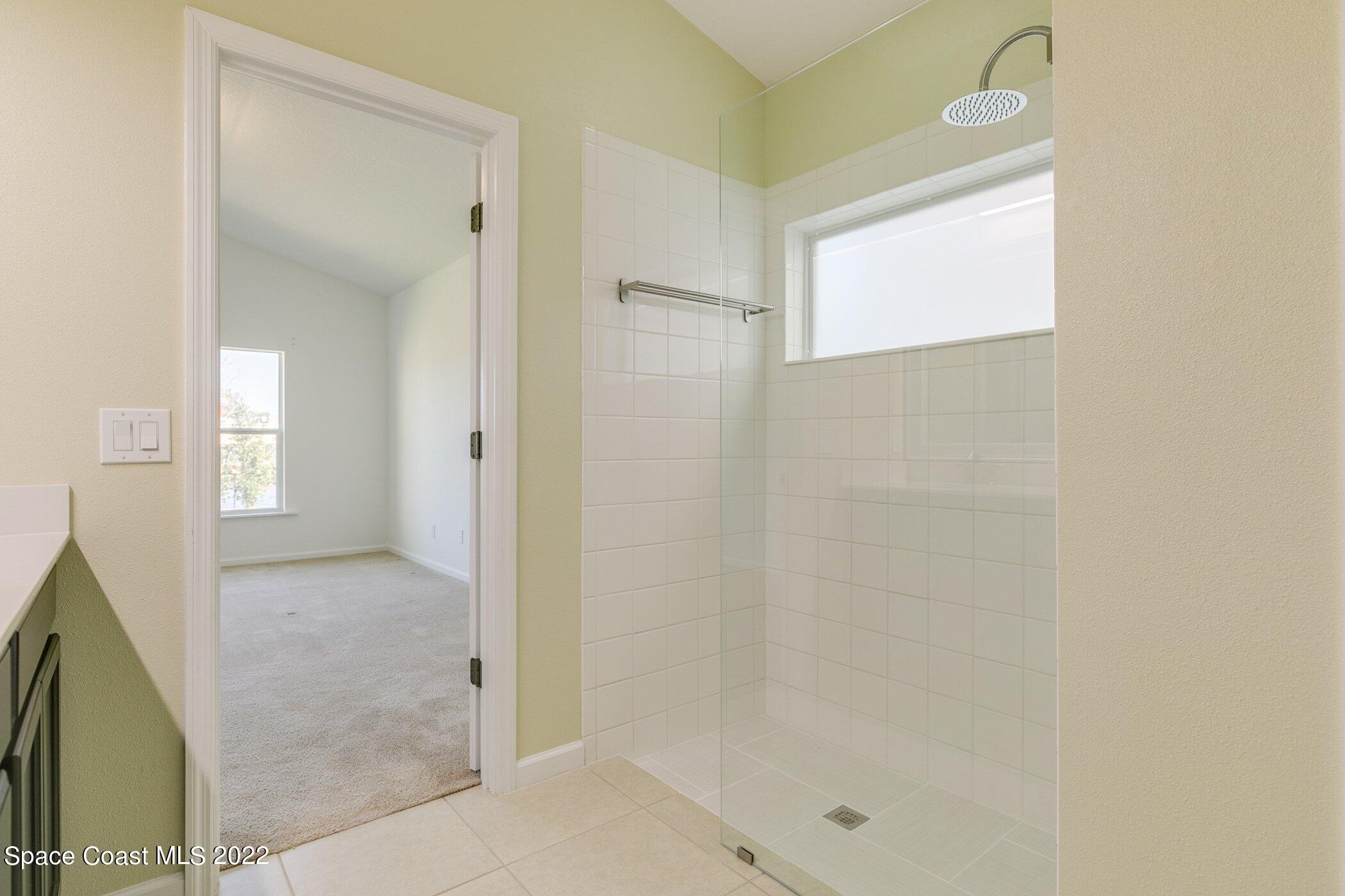 3555 Tabitha Court Melbourne, FL 32934 - Photo 21 of 30 a bathroom with a shower