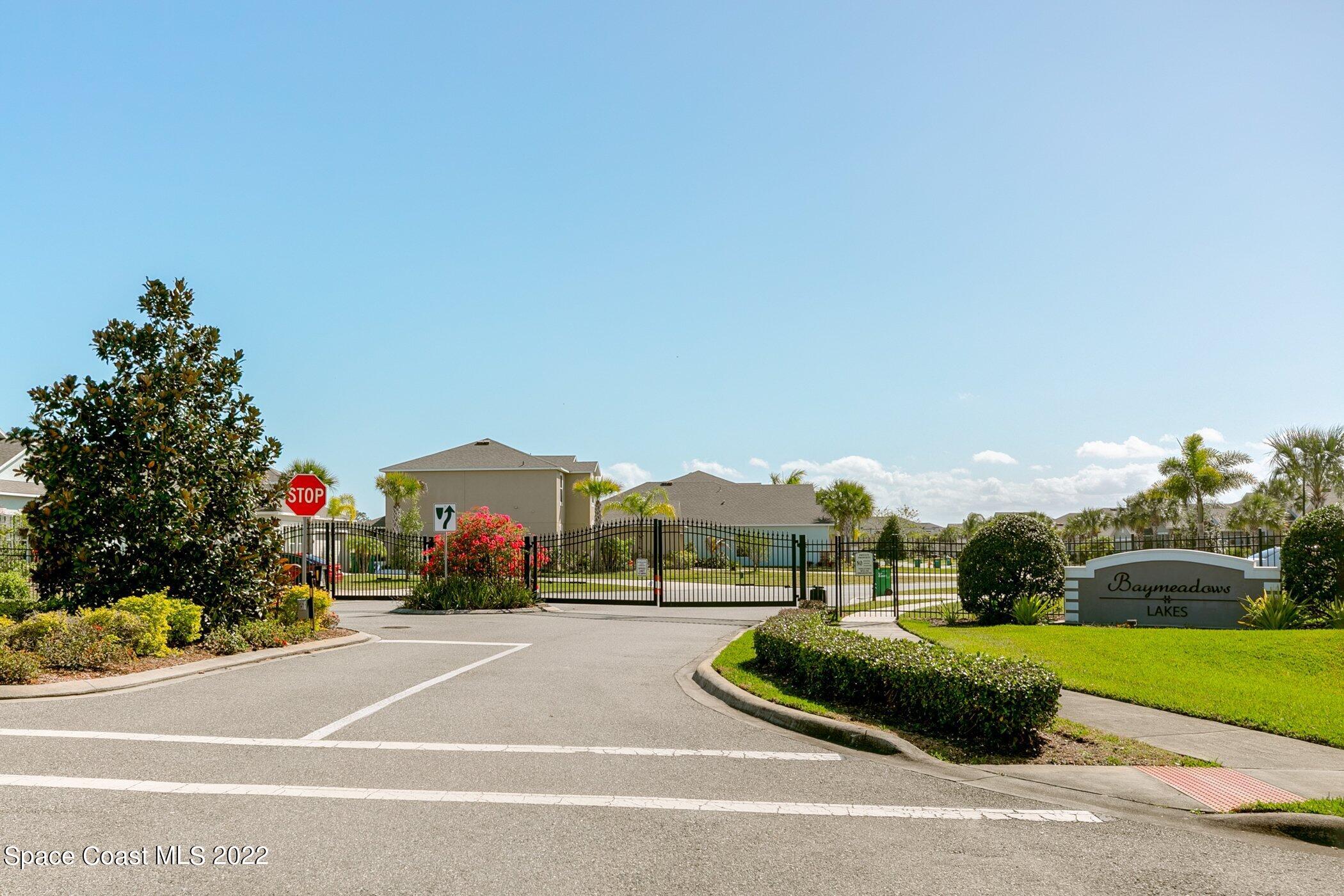 3555 Tabitha Court Melbourne, FL 32934 - Photo 30 of 30 a view of street with houses and car parked