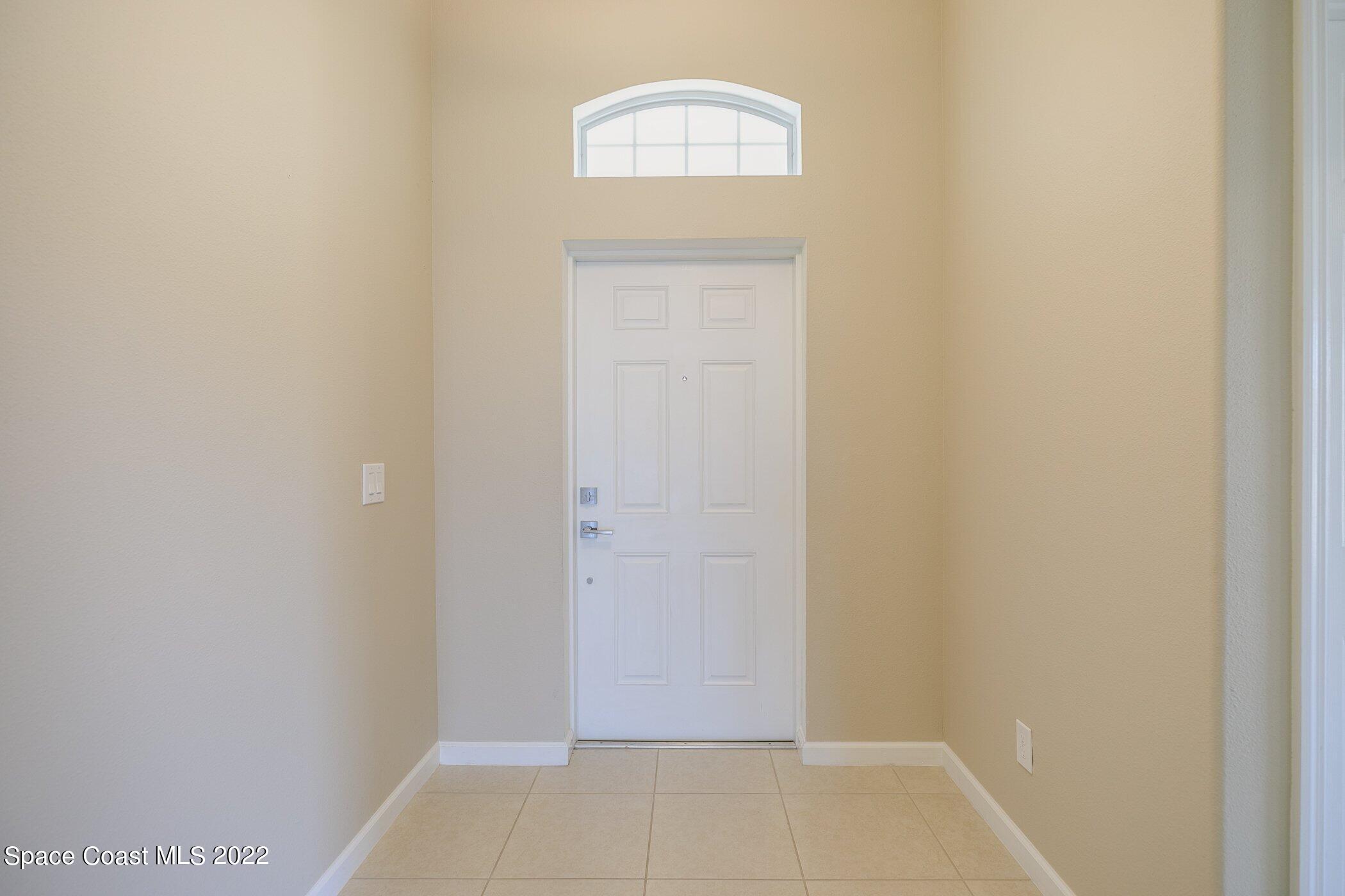 3555 Tabitha Court Melbourne, FL 32934 - Photo 3 of 30 a view of front door