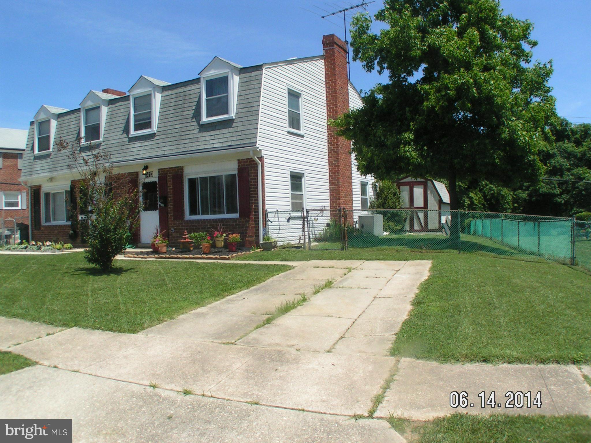 7413 Forrest Avenue Baltimore, MD 21234 - Photo 7 of 14 a front view of house with yard