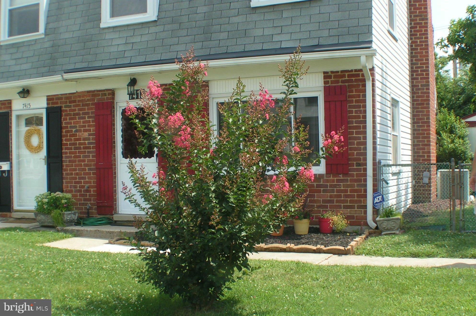 7413 Forrest Avenue Baltimore, MD 21234 - Photo 10 of 14 a view of a potted plants in front of a house