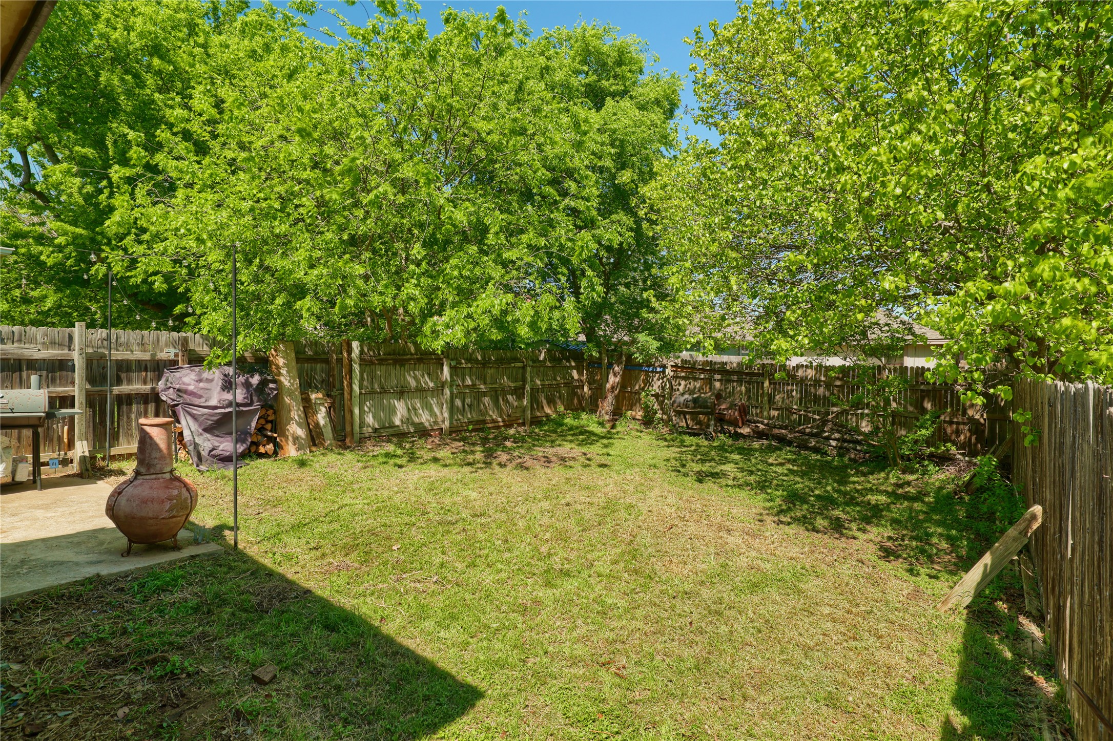 827 Topaz Lane Leander, TX 78641 - Photo 21 of 22 a backyard of a house with seating space