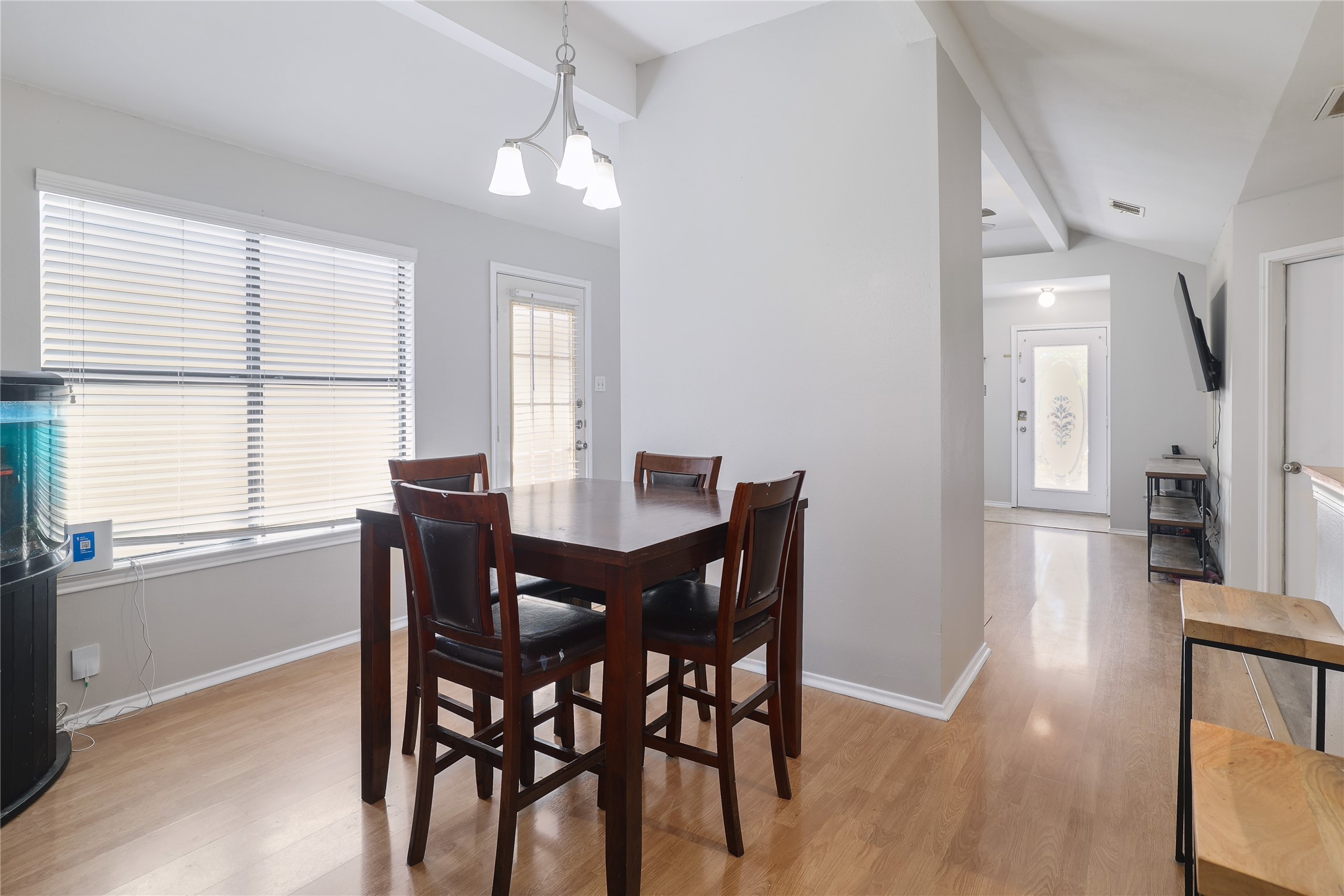 827 Topaz Lane Leander, TX 78641 - Photo 9 of 22 a view of a dining room with furniture and window