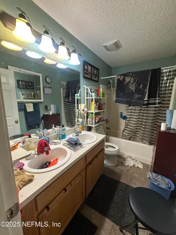 a view of a livingroom with furniture and front door