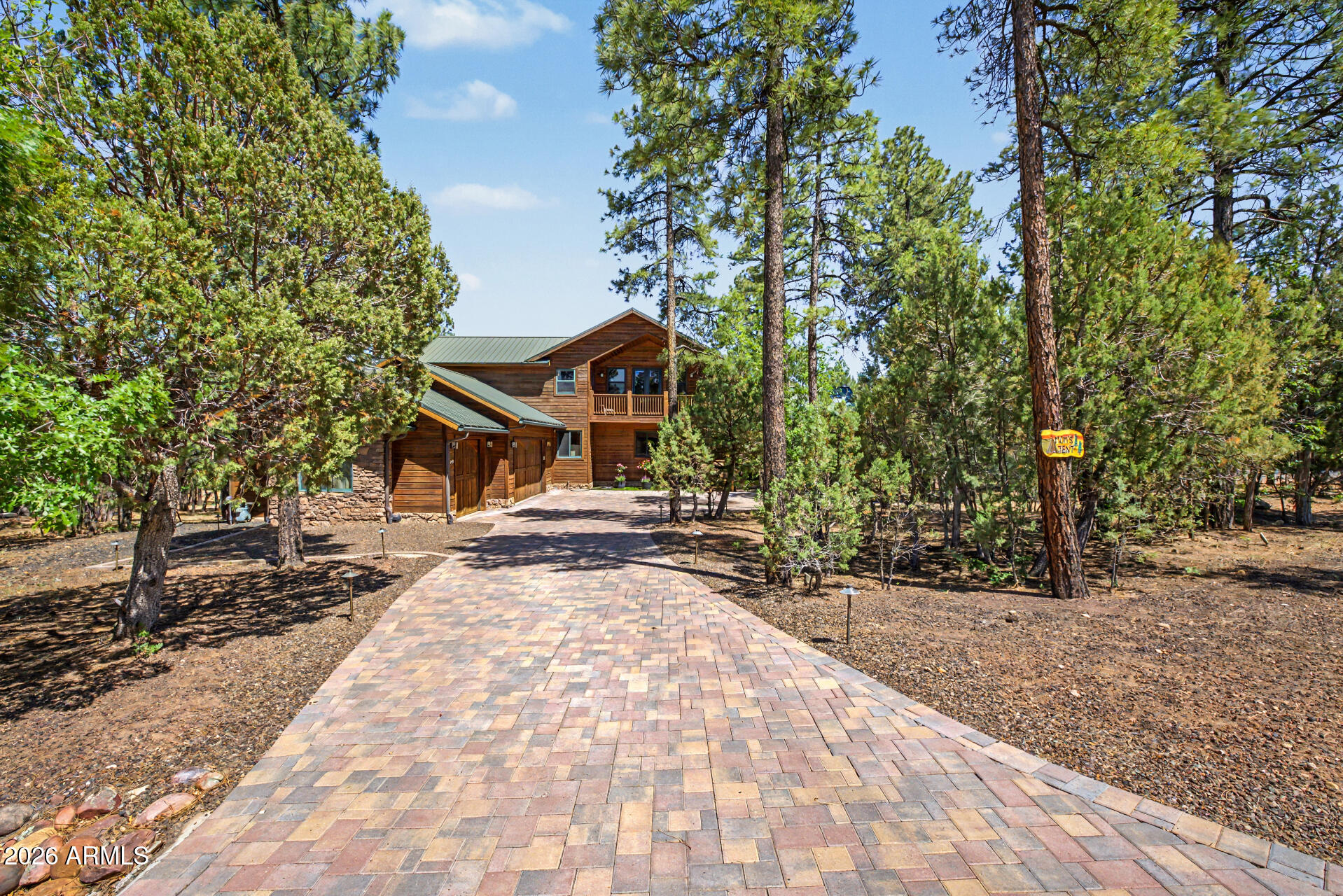1681 South Jimson Loop Show Low, AZ 85901 - Photo 6 of 105 a view of a backyard with a sitting area