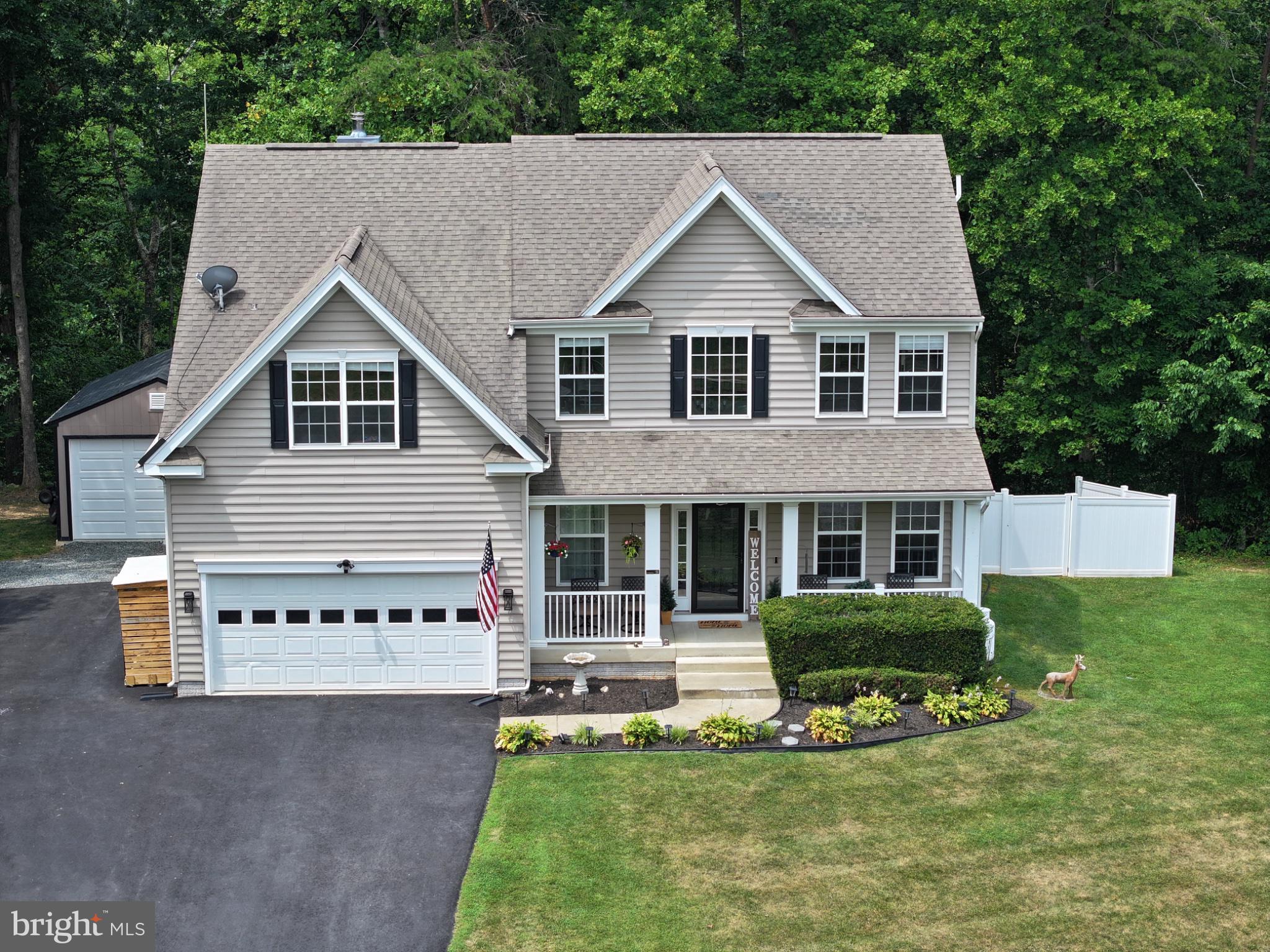 239 Toluca Road Stafford, VA 22556 - Photo 5 of 75 Charming home with lush greenery backdrop.