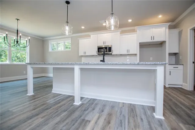 a white bath tub sitting in a bathroom