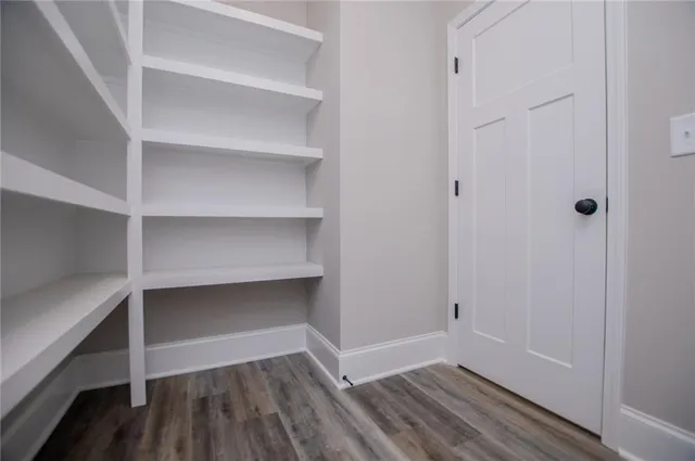 a view of house with yard and entertaining space