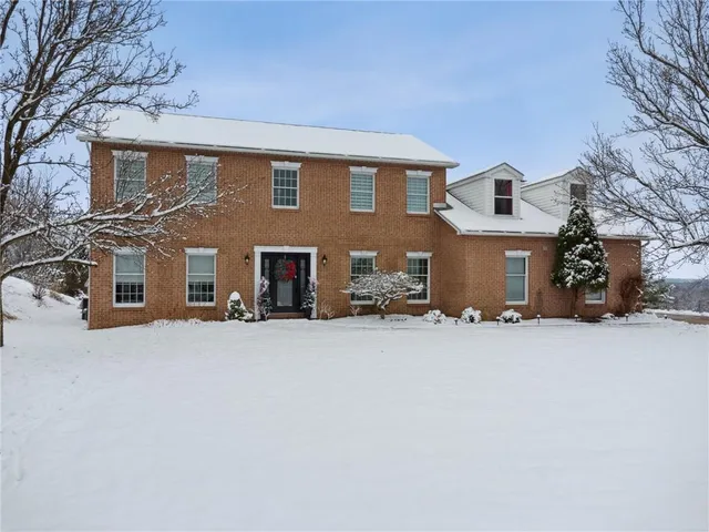 front view of a house with a street