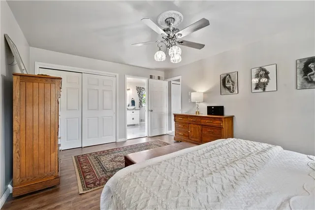 a bathroom with a sink vanity and mirror