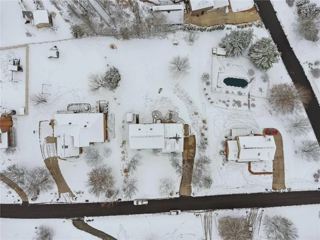 an aerial view of a house with a garden