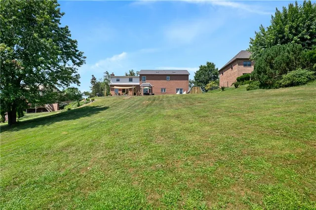 a view of a table and chairs in the garden