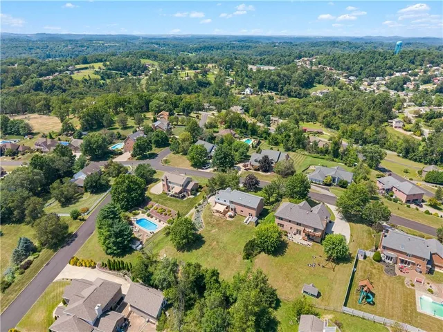 an aerial view of a city with lots of residential buildings