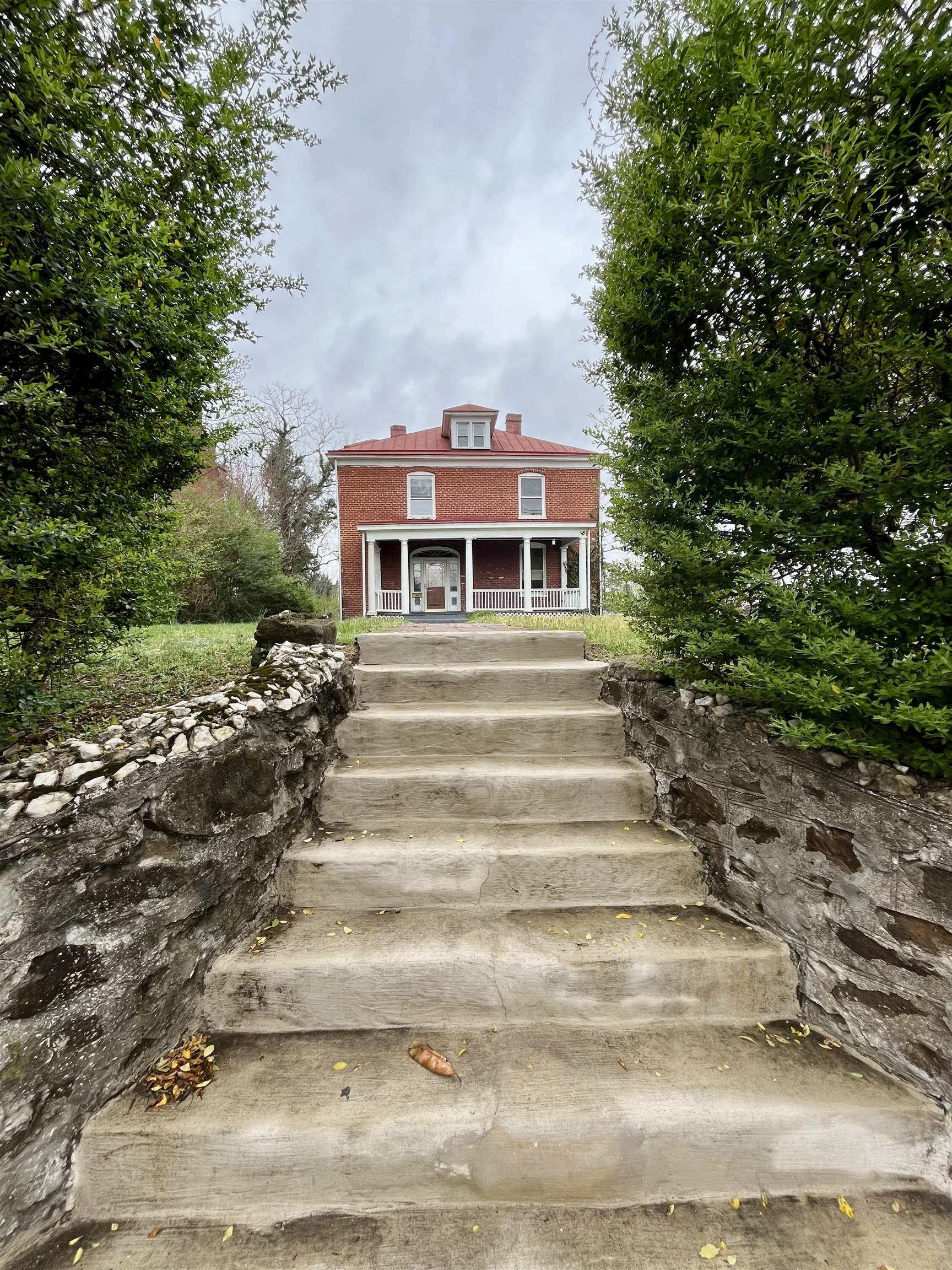 501 Ridge Street Charlottesville, VA 22902 - Photo 1 of 47 a front view of a house with a yard