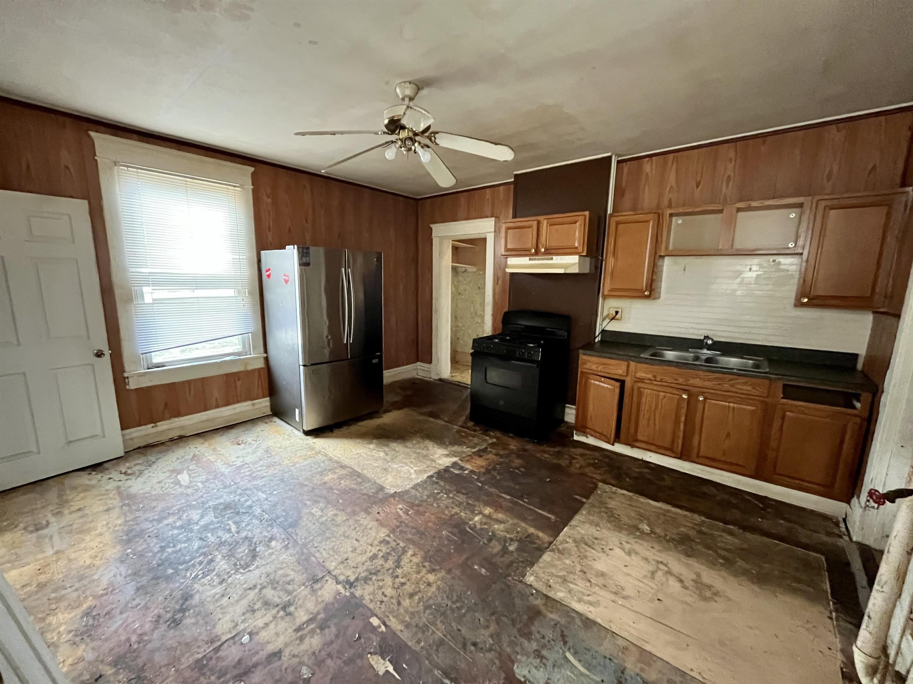 501 Ridge Street Charlottesville, VA 22902 - Photo 16 of 47 a view of a kitchen with a sink and a refrigerator