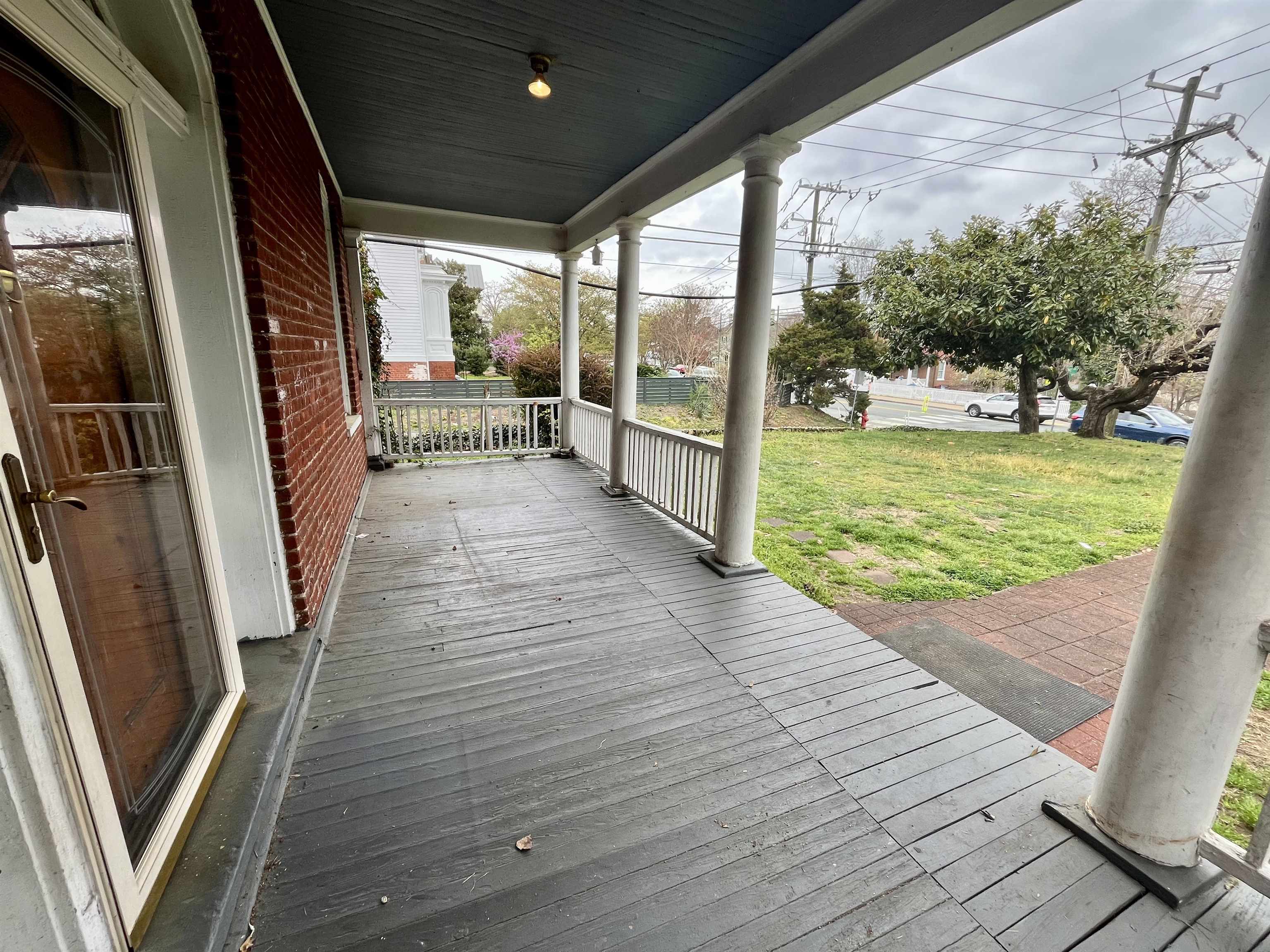 501 Ridge Street Charlottesville, VA 22902 - Photo 36 of 47 a view of a porch with wooden floor and outdoor space
