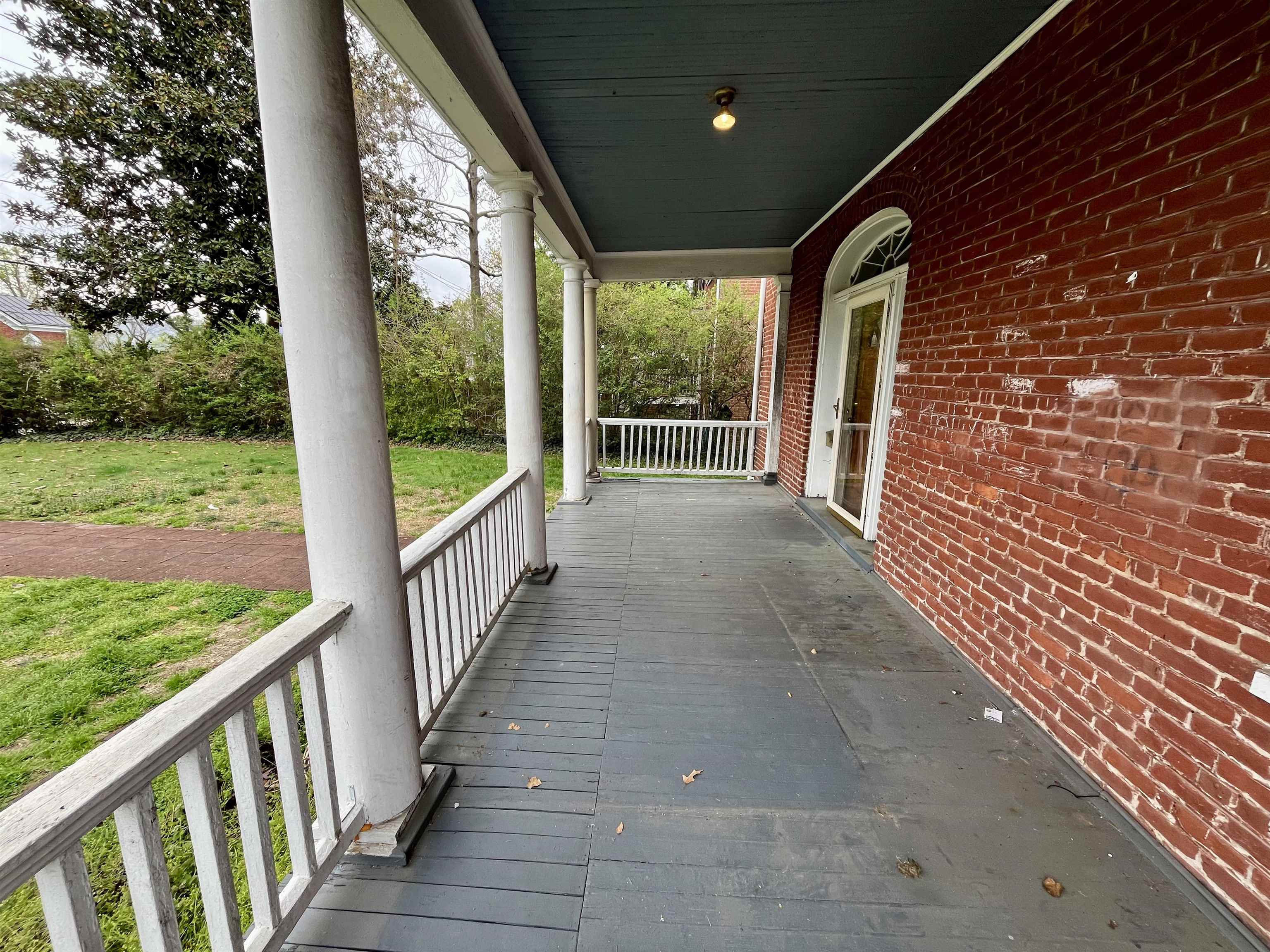 501 Ridge Street Charlottesville, VA 22902 - Photo 37 of 47 a view of a porch with wooden floor and outdoor space