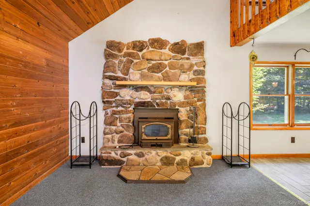 a bathroom with a toilet a sink and a mirror