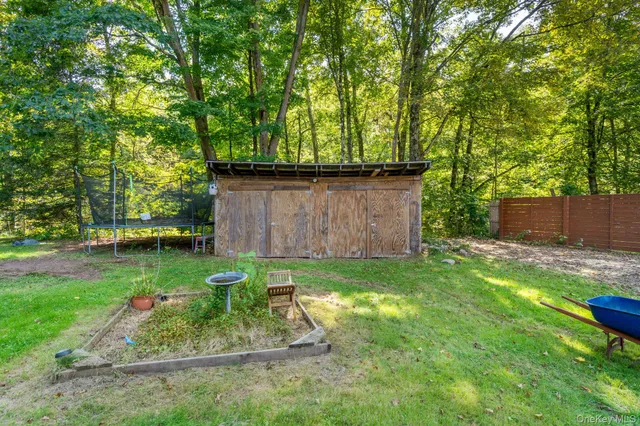 a view of a balcony with wooden floor